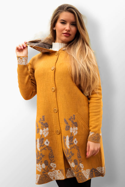 Anita mustard yellow hooded coat with floral texture.