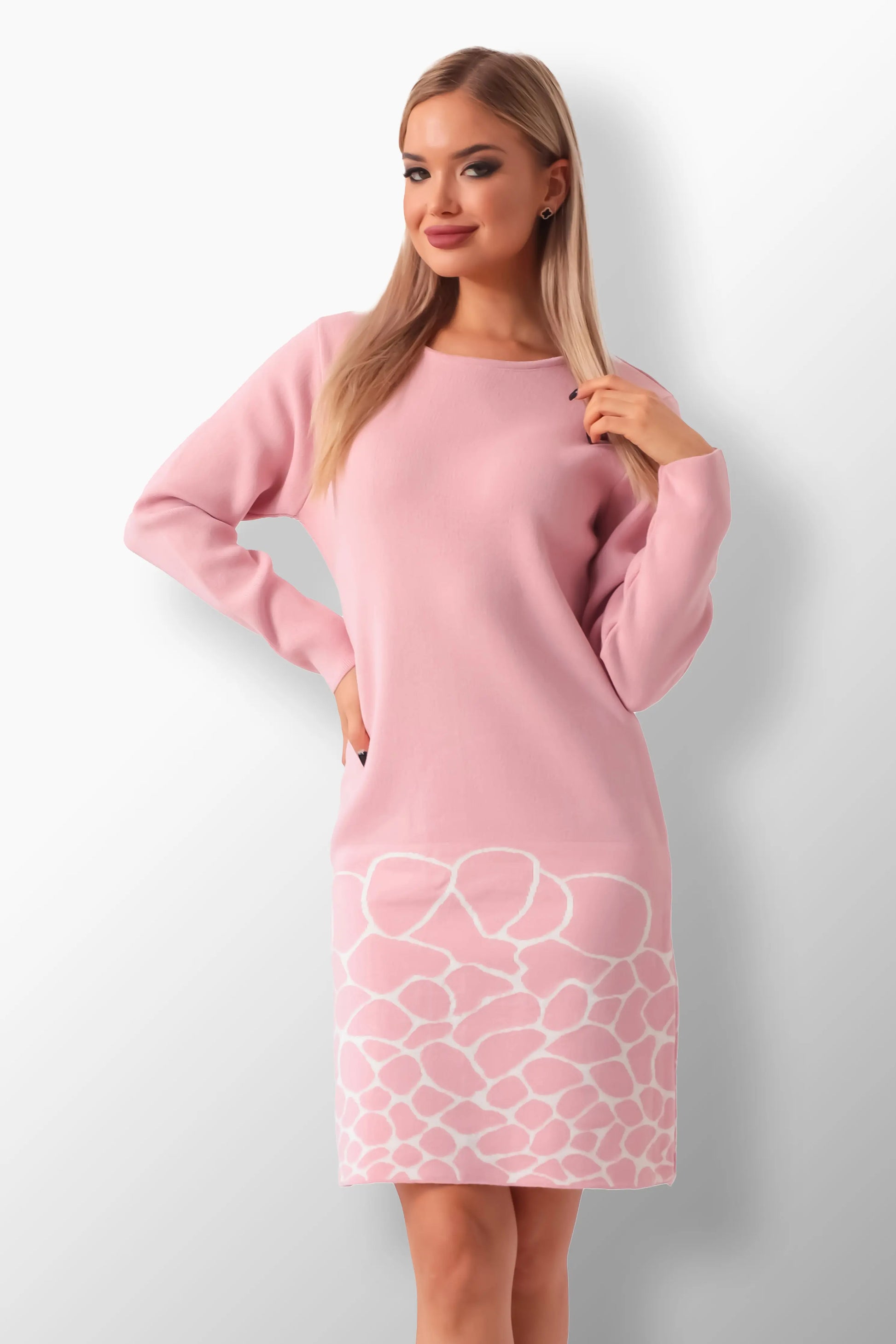 Model wearing Bellini knit dress with elegant design.