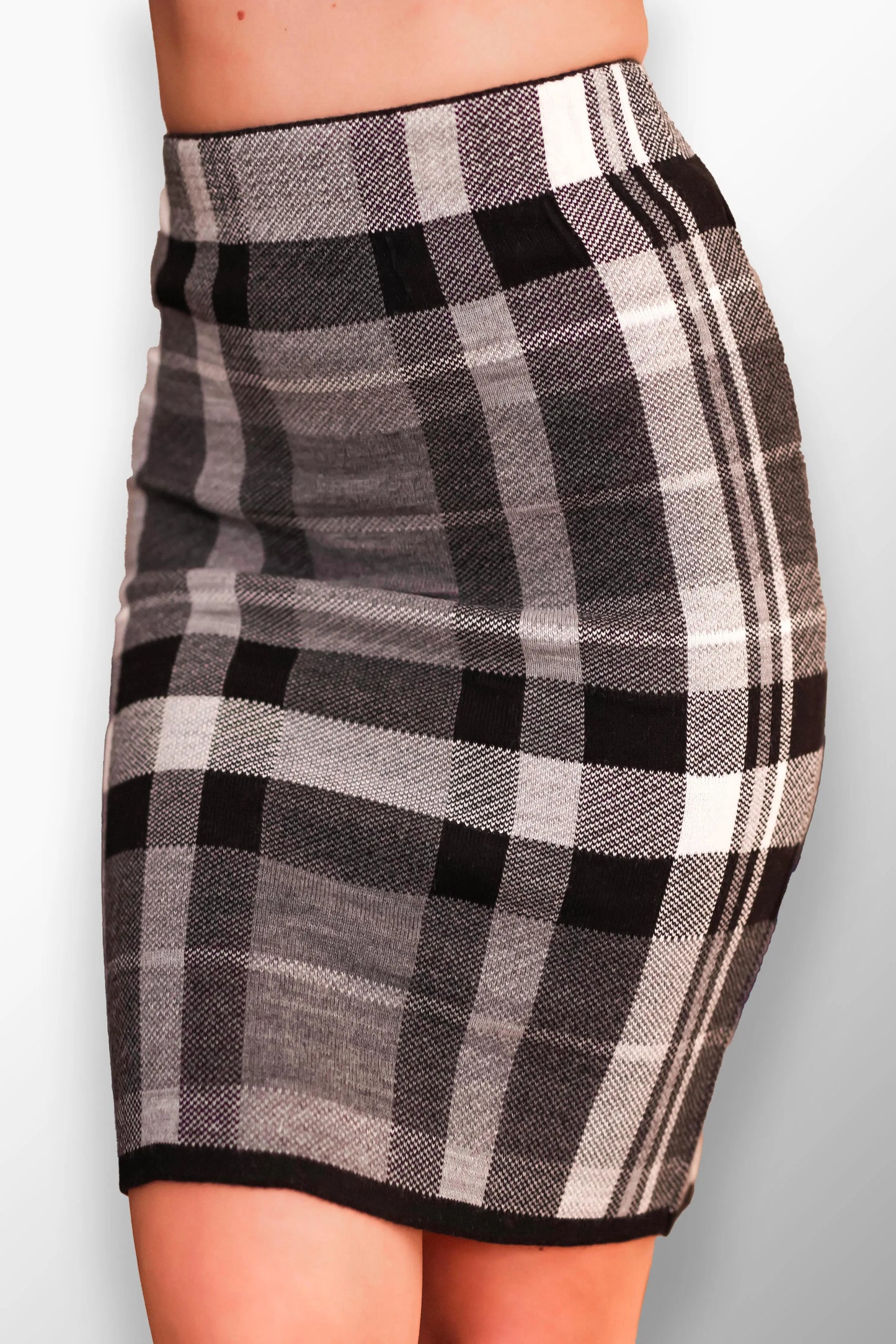 Blanka High-Waisted Plaid Midi Skirt - Close-up of plaid texture and fabric.