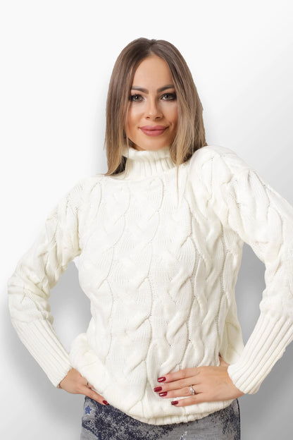 Dolli white cable knit turtleneck sweater.