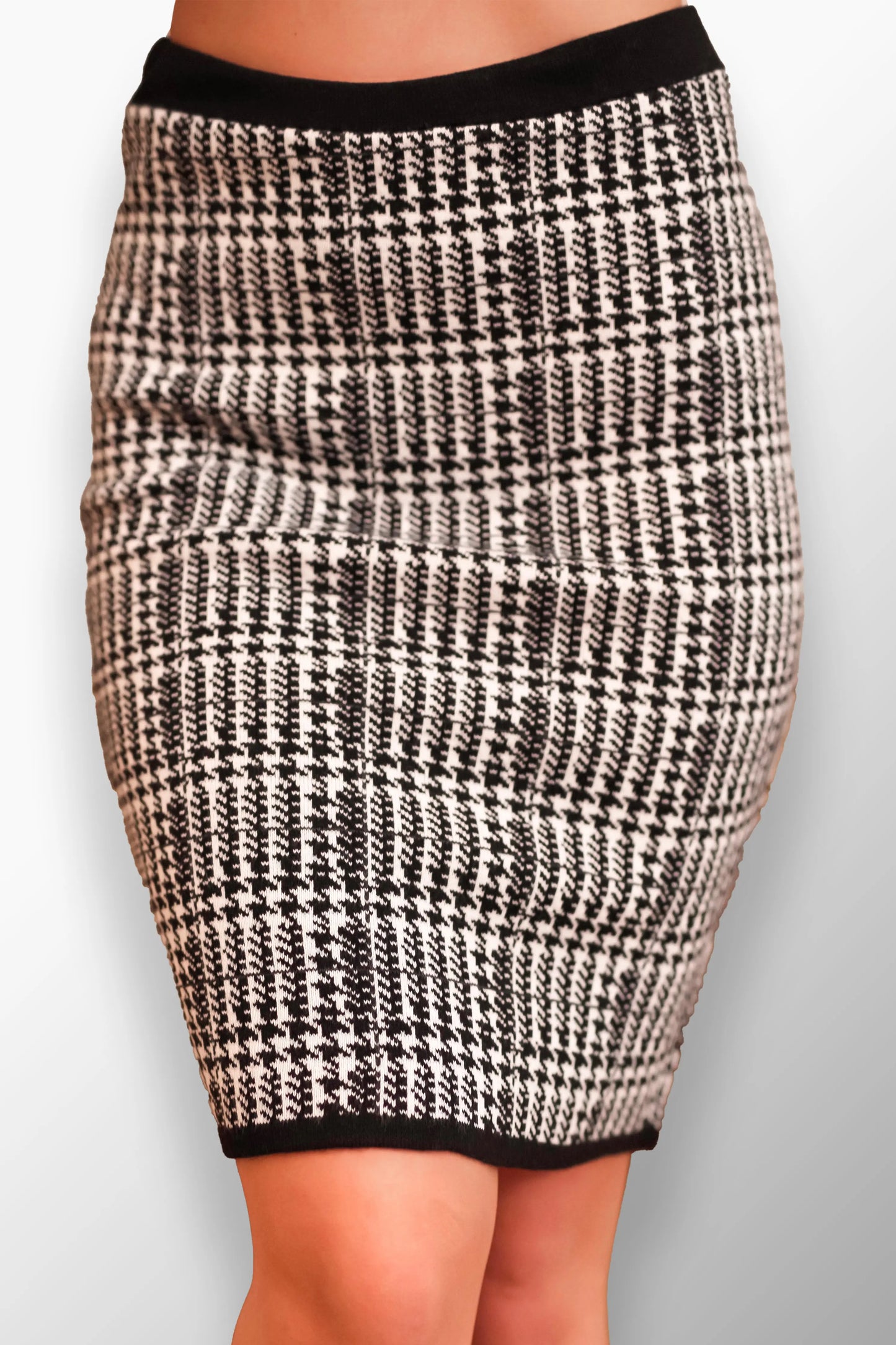 Donata High-Waisted Plaid Midi Skirt - Front view of bold plaid design.