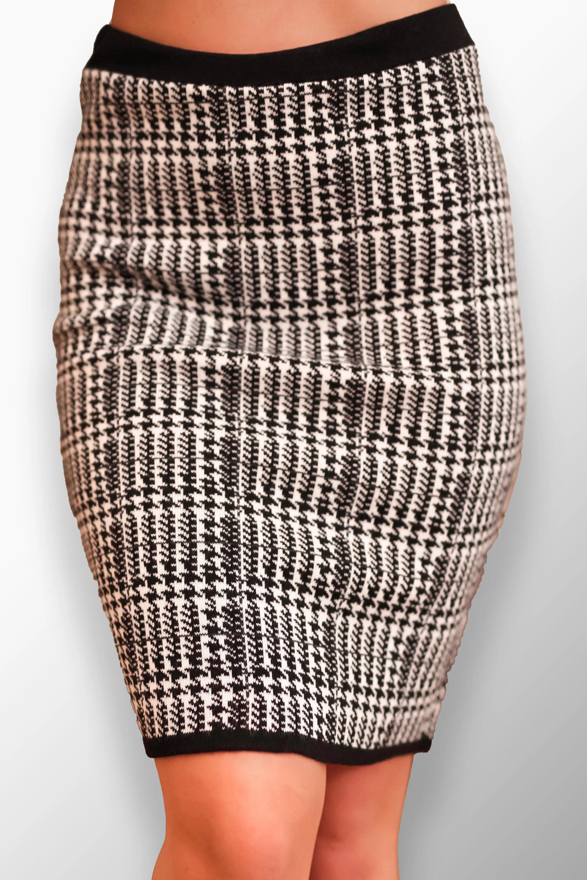 Donata High-Waisted Plaid Midi Skirt - Front view of bold plaid design.