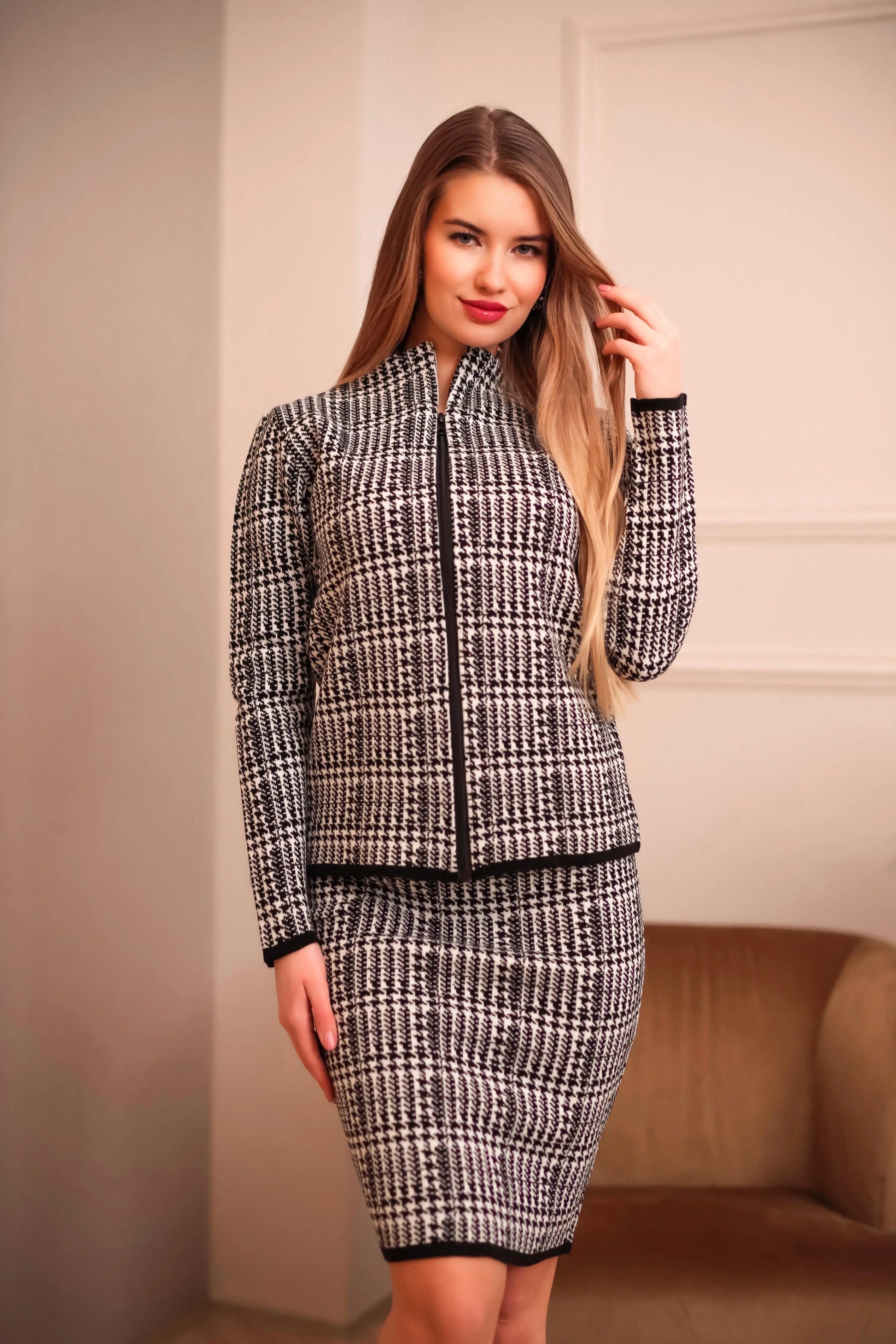 Woman in a sleek zippered plaid wool-blend coat for winter layering.