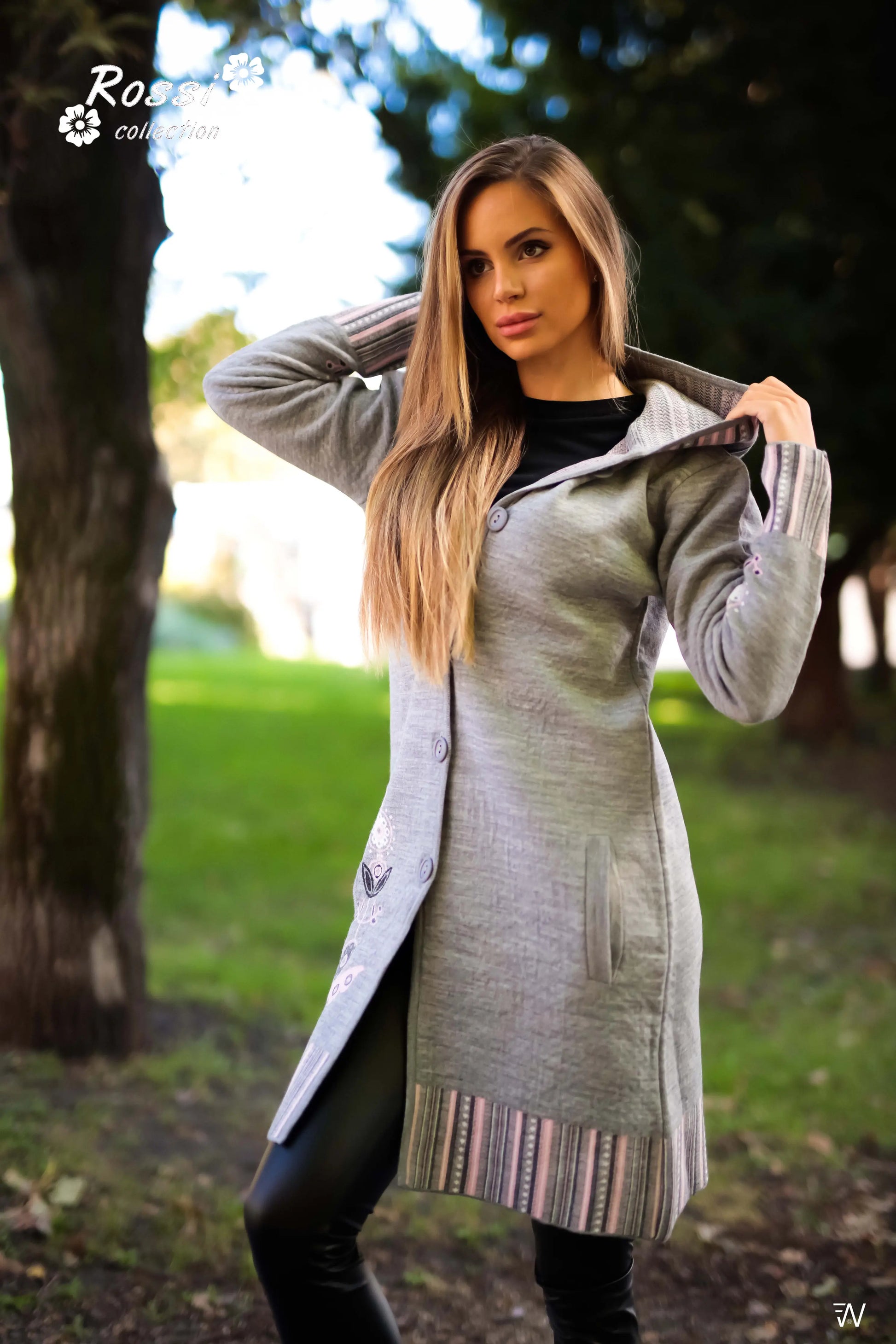 Cozy and warm hooded coat in gray.