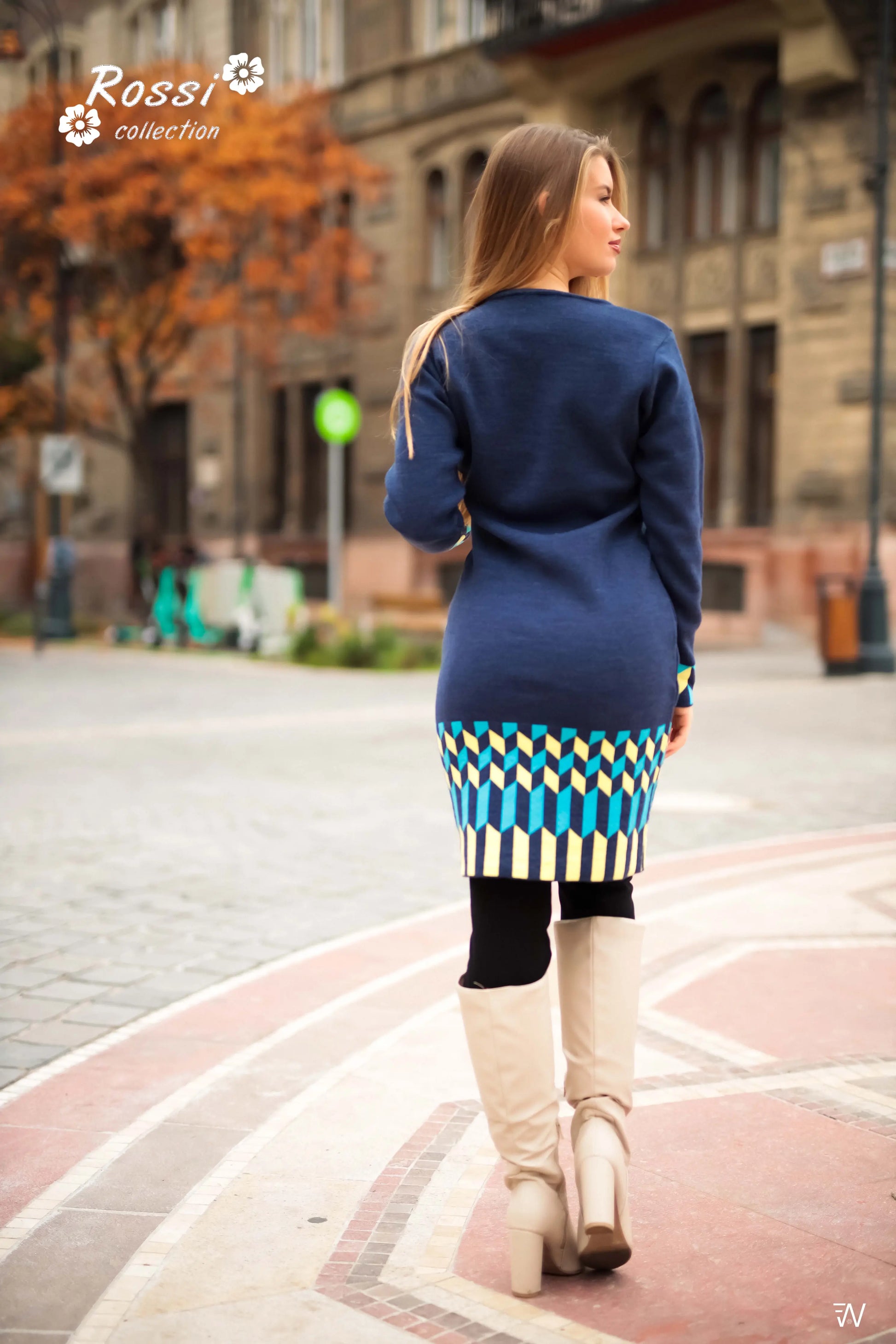 Full view of Rita knit dress in navy with chevron design.