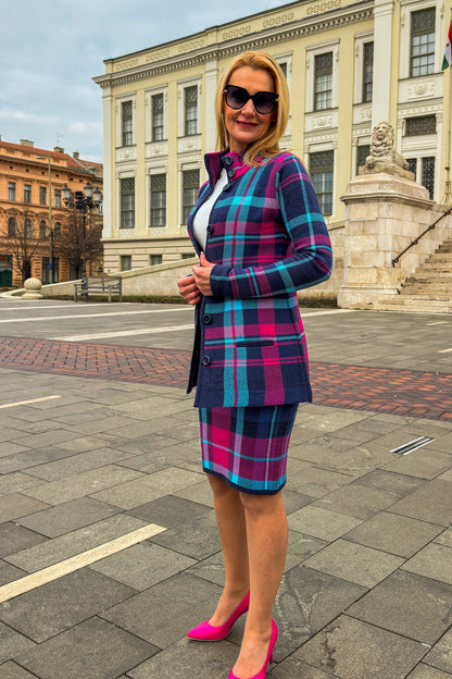 Model styled in a classic navy and pink plaid wool-blend short coat.