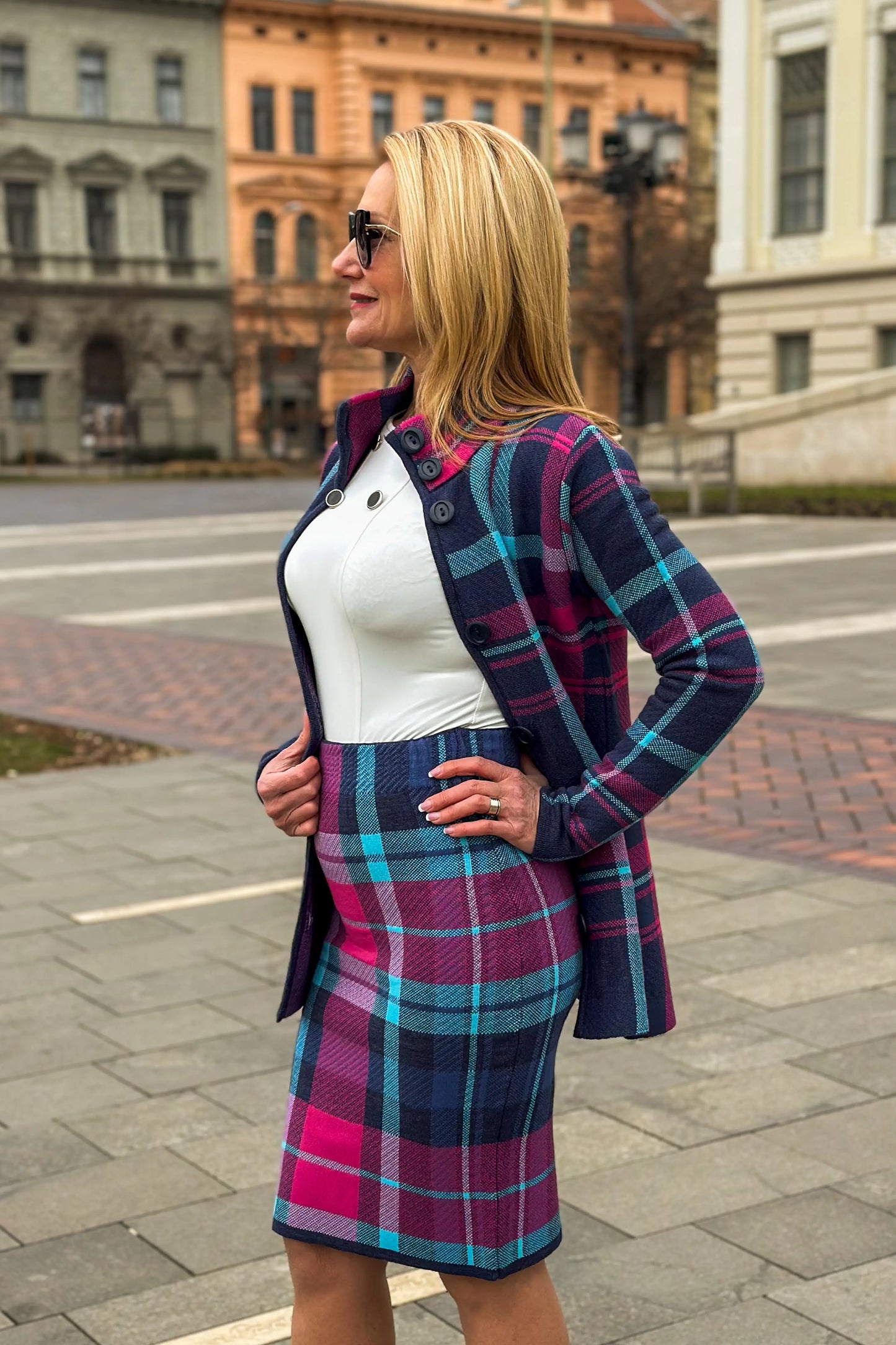 side view of timea plaid midi skirt with matching short coat in navy