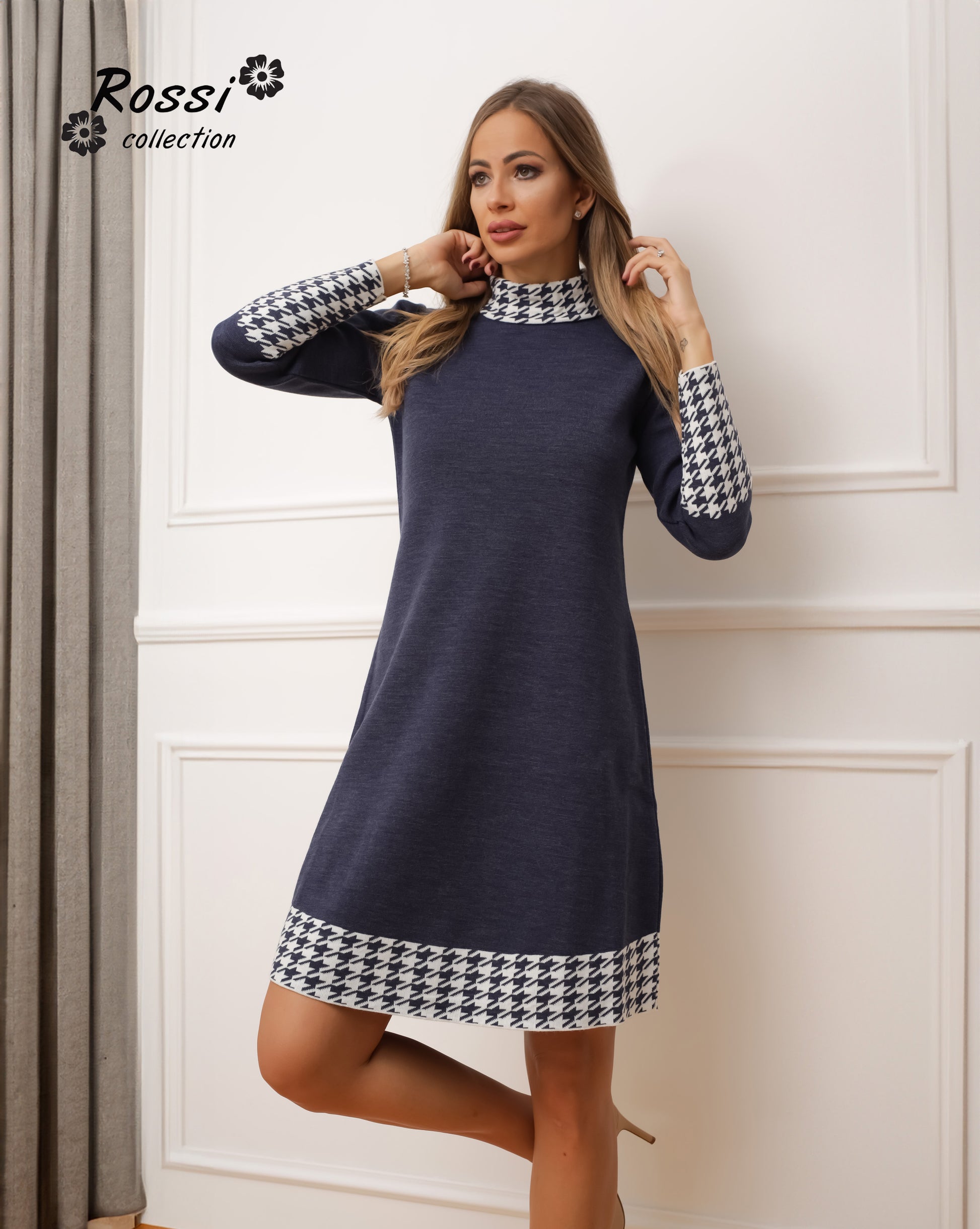 High-neck Tina dress with classic plaid detail.