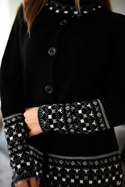 Close-up of Zseljana coat’s detailed High-Neck pattern.